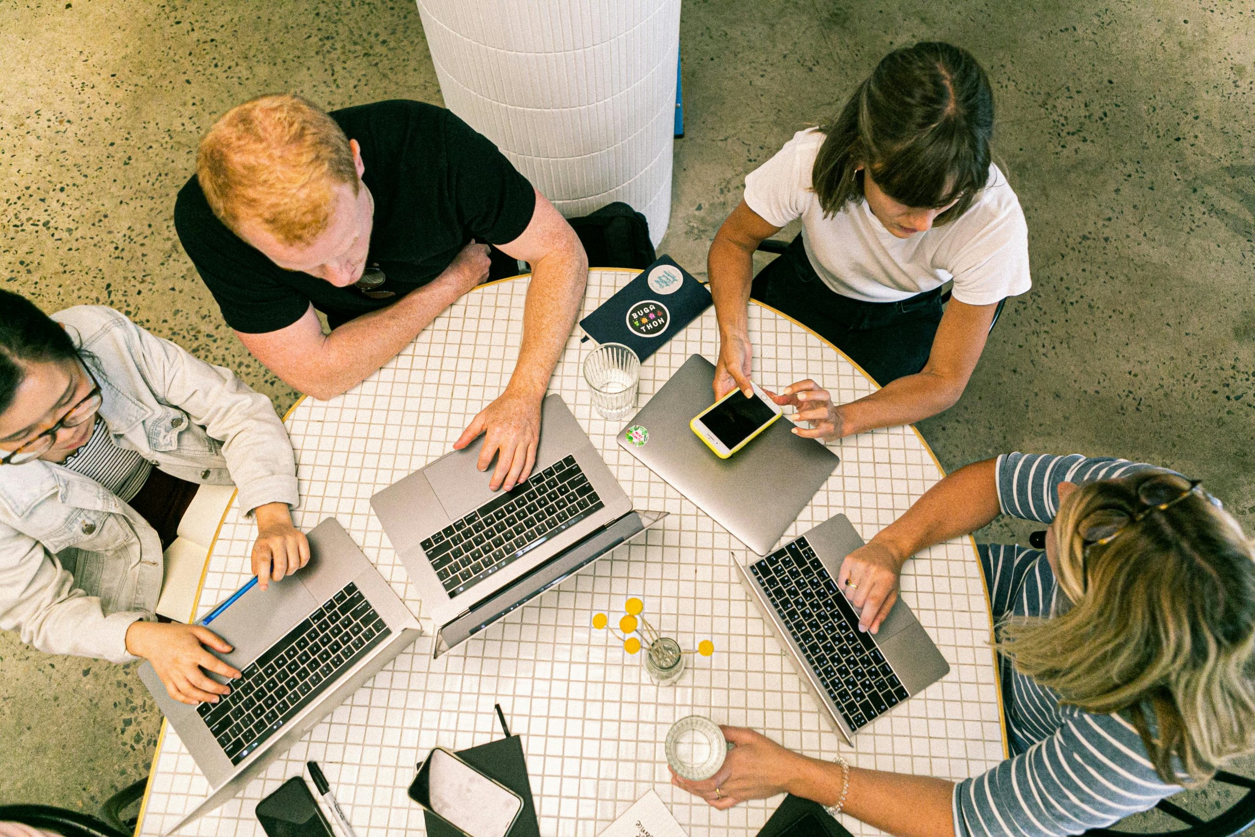 Group of people working in a home set up